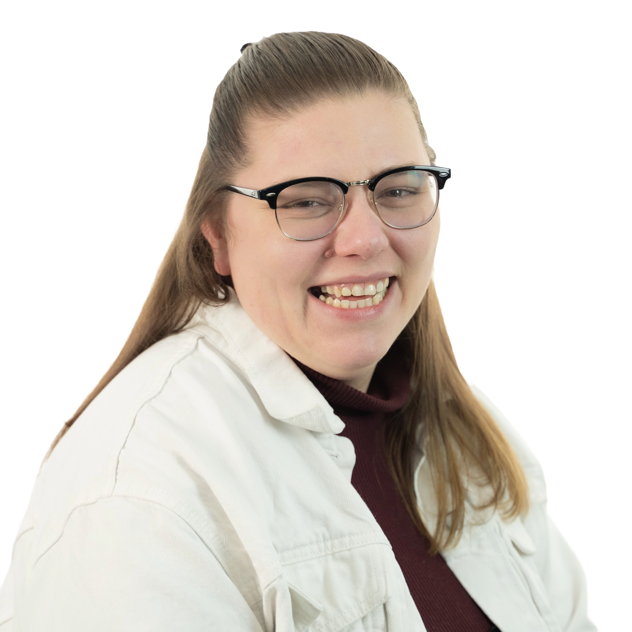 Smiling woman with long hair on a green background.